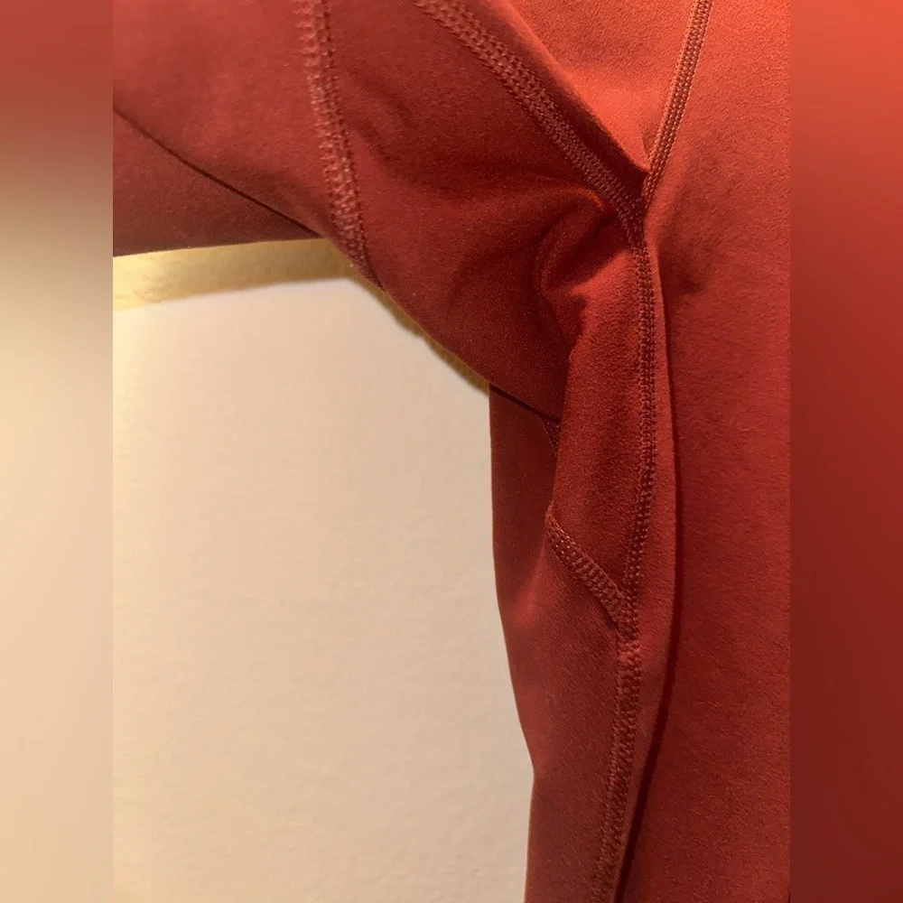 Uniqlo women’s burnt orange athletic leggings M activewear athleisure pockets